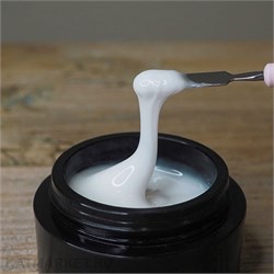 {{photo.Alt || photo.Description || 'Опция 50мл Молочный гель моделирующий средней вязкости'}}